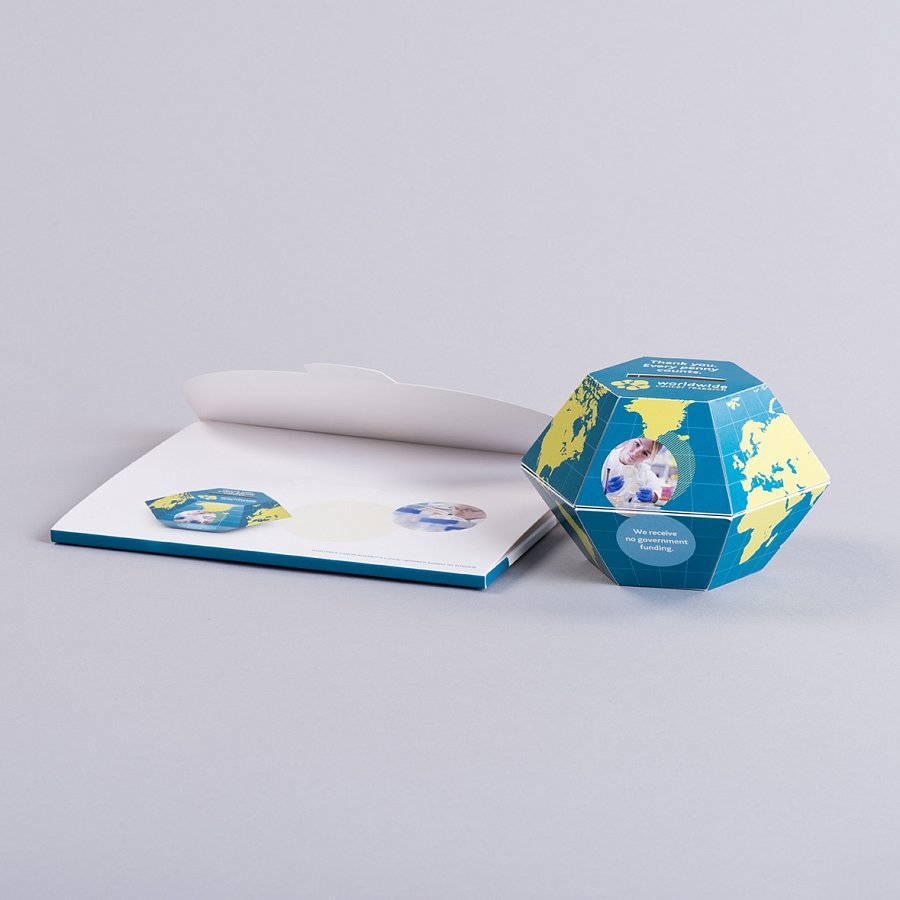 Pop up ball with unglued wallet