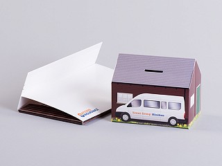 Pop up house with pen holes or coin slot