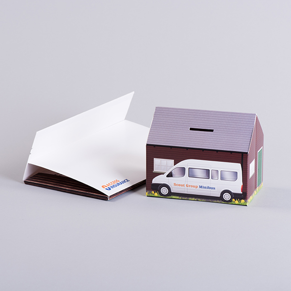 Pop up house with pen holes or coin slot